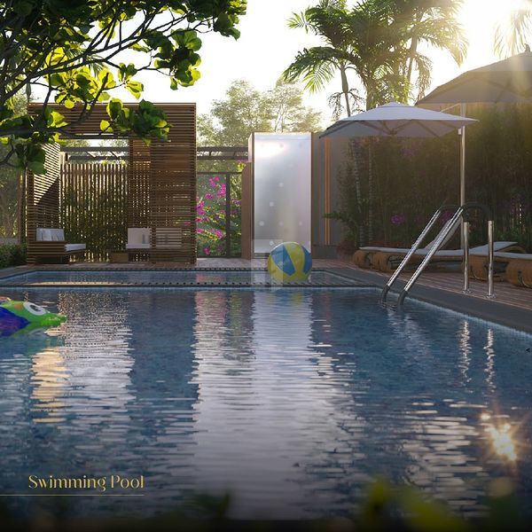 Luxurious swimming pool at SreeChaitanya Urban Abode, offering properties for sale in Hyderabad.